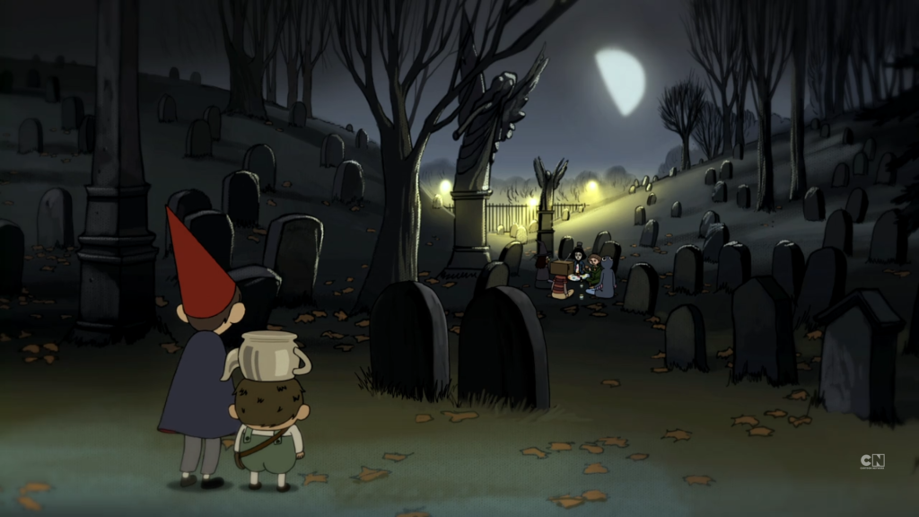 Wirt and Greg watch a witches gathering under the moon in the Eternal Garden Cemetery